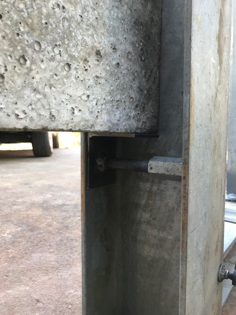 Galvanised sleeper jack for support of concrete sleepers in the construction of  concrete  rail fences or in the construction of retaining walls where steps are required to support the sleeper up and down the hill 